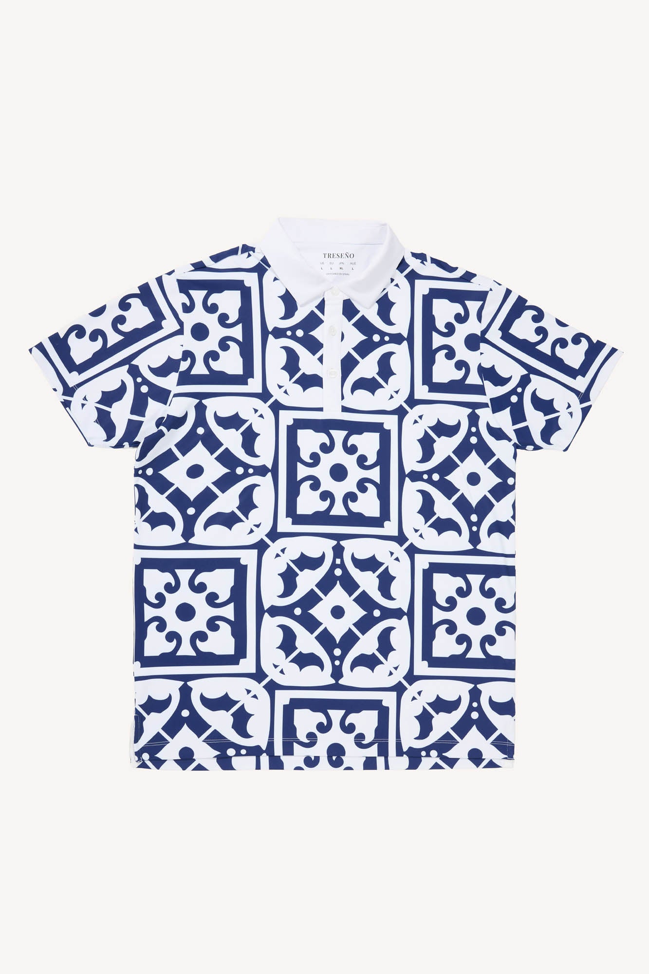 White performance polo golf shirt with blue geometric pattern resembling tiles found on the Iberian peninsula on a white background