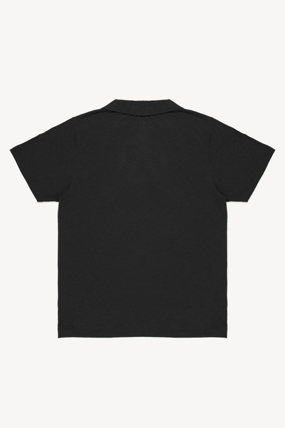 Black polo shirt on a white background