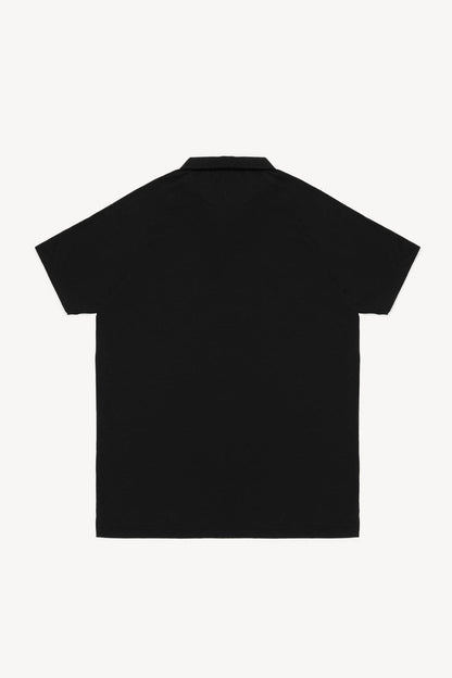 Black polo shirt on a white background