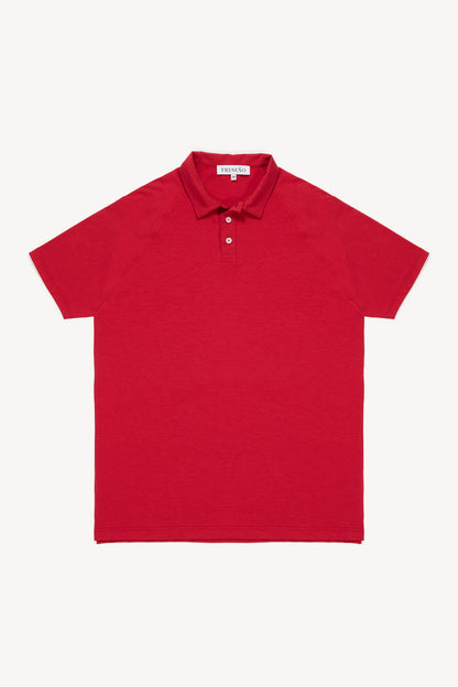 Red polo shirt on a white background