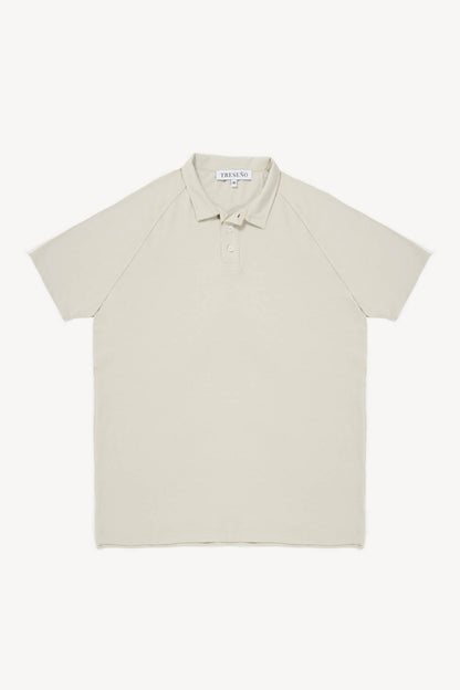 Beige polo shirt on a white background