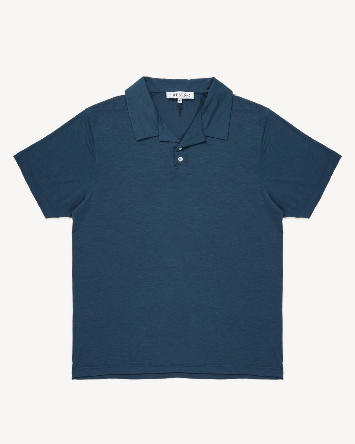 Blue grey cuban polo shirt on a white background