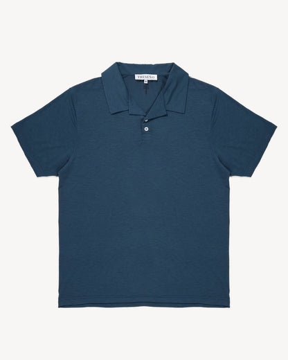 Blue grey cuban polo shirt on a white background