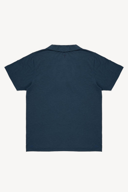 Blue grey cuban collar polo shirt on a white background