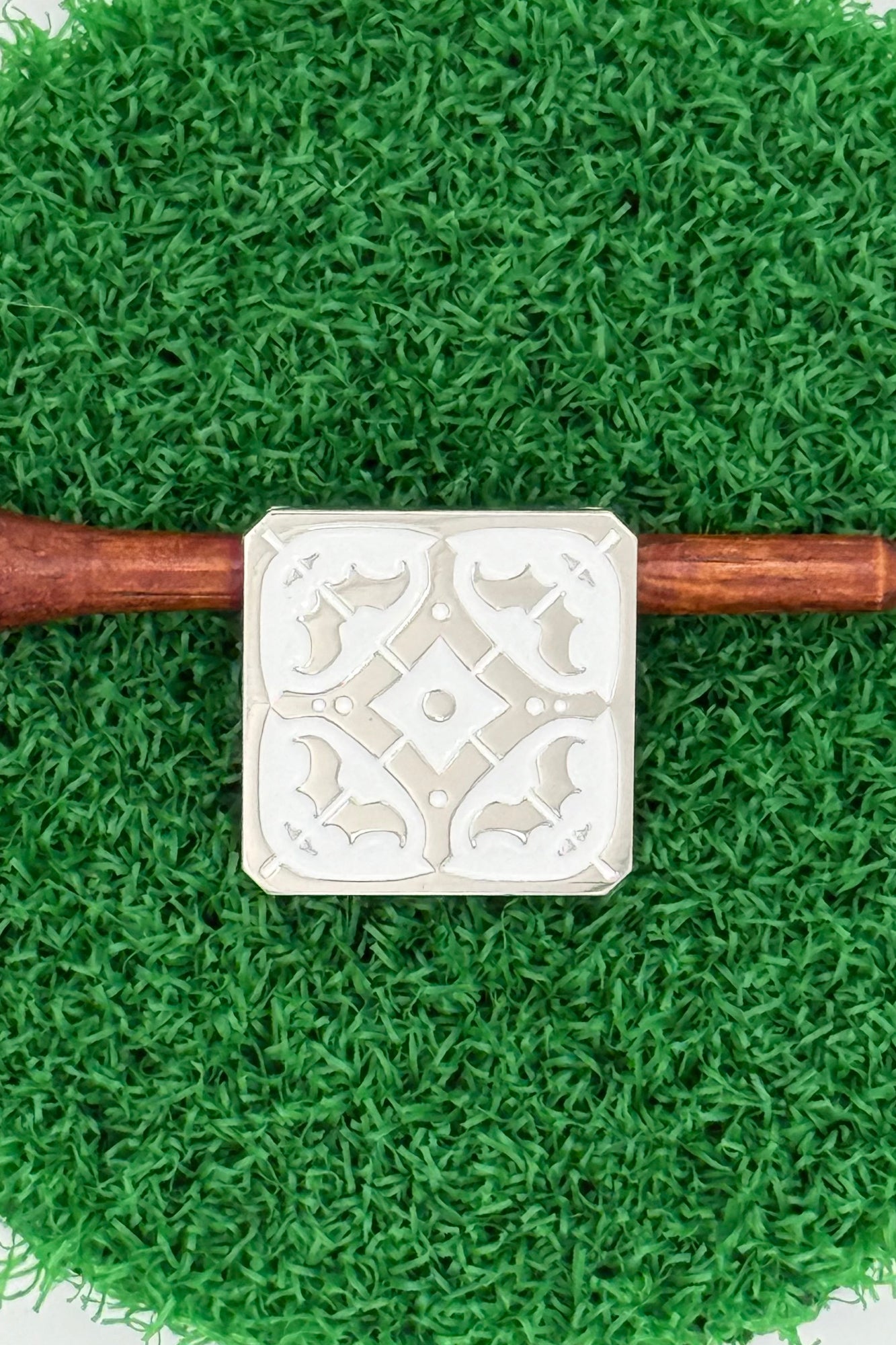 silver golf ball mark with Iberian tile (azulejo) engraving
