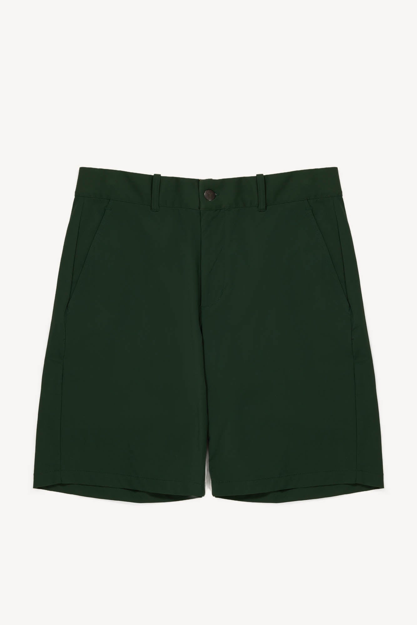 Dark green performance shorts on a white background