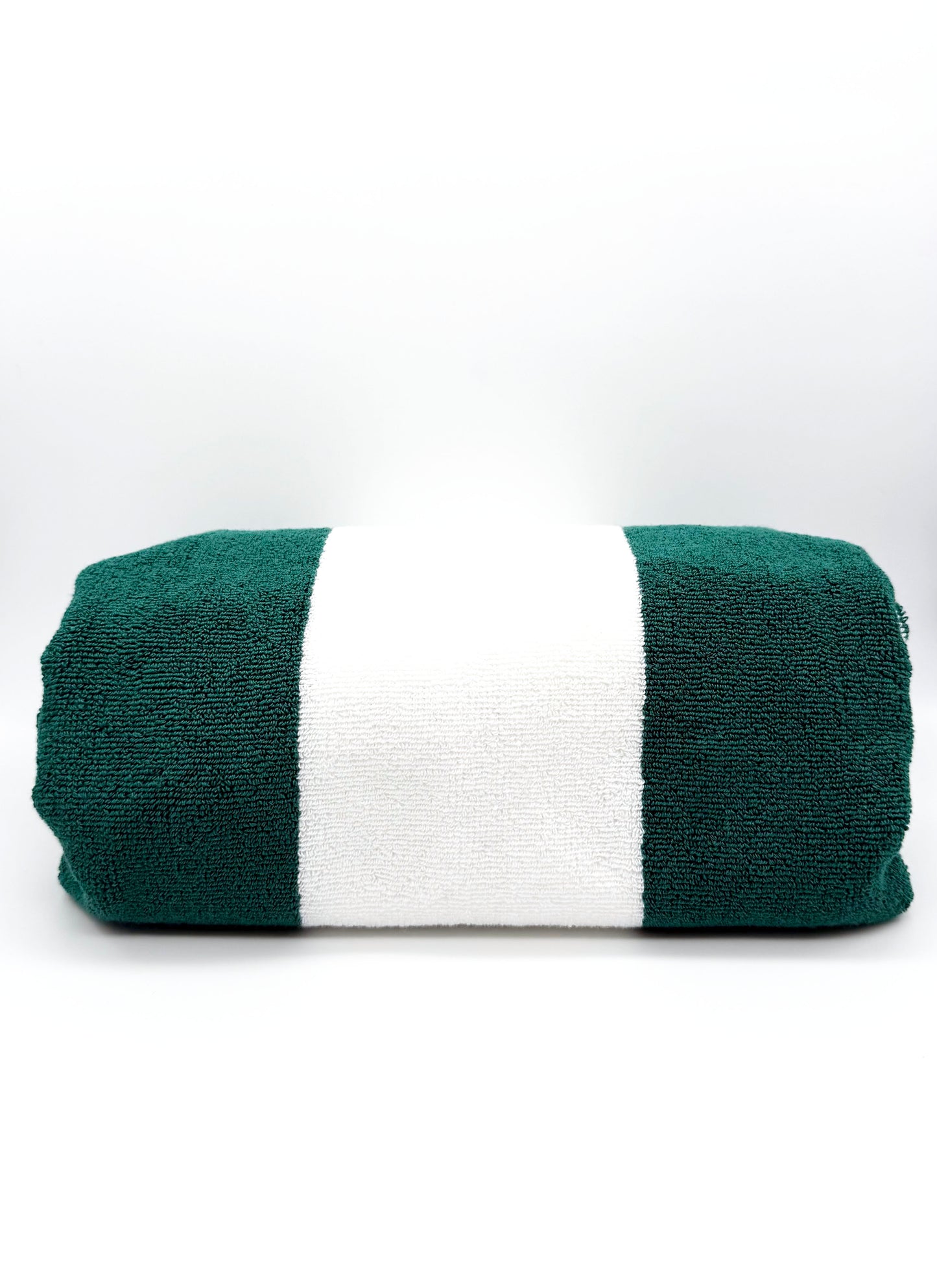 Green and white striped players towel on a white background