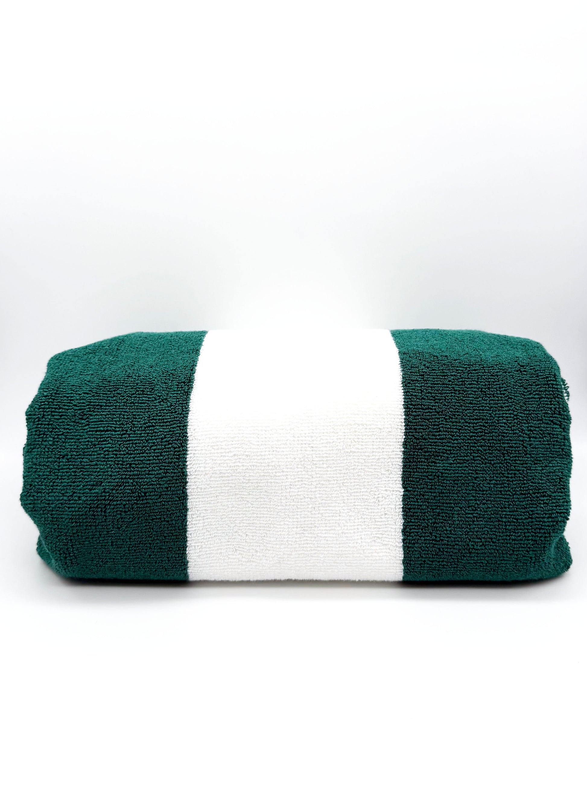 Green and white striped players towel on a white background