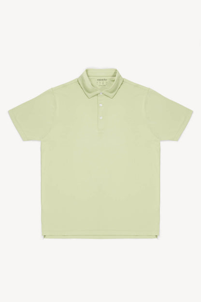 Light green performance golf polo shirt on a white background