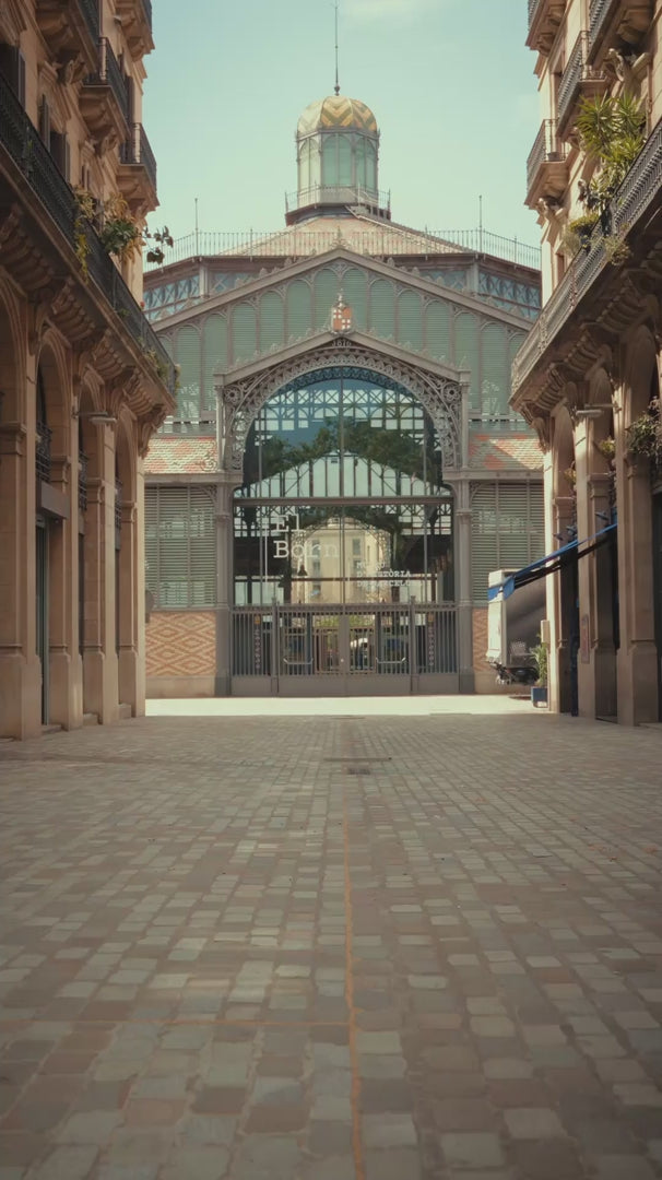 Man in Barcelona in front of a market